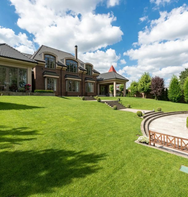 Photo of a front yard with a beautiful landscape