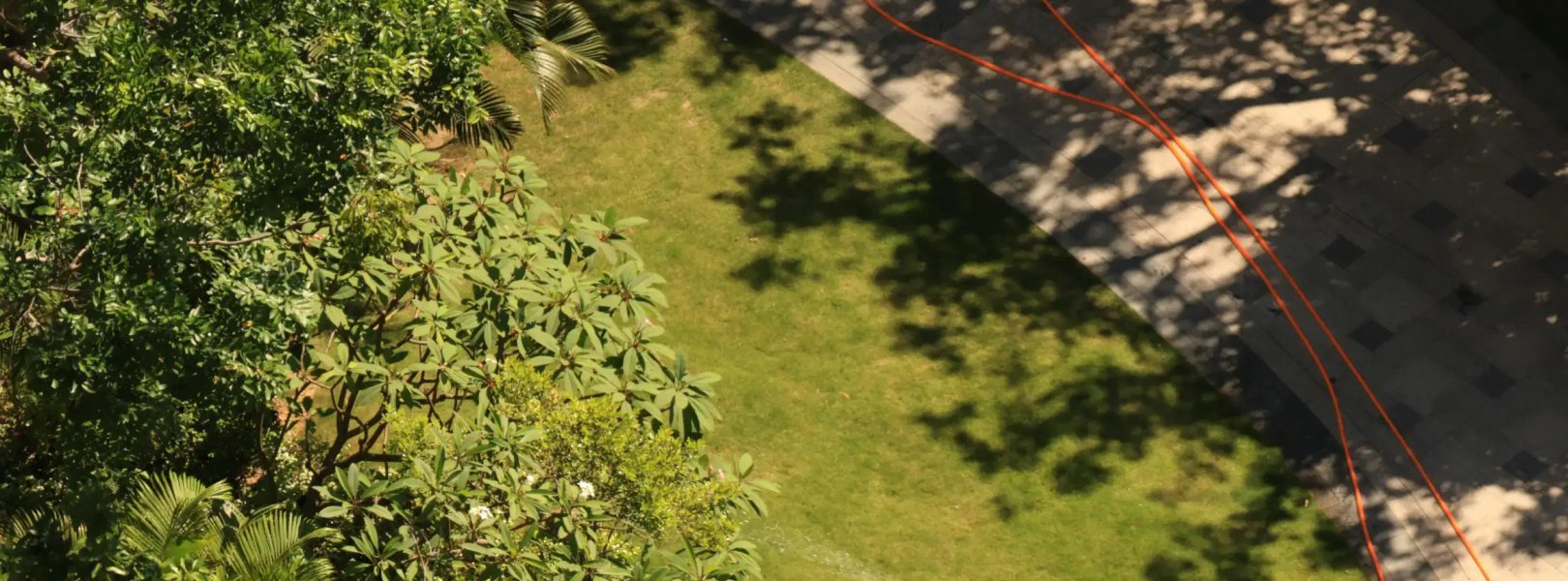 Photo of VerdeStone Worker watering a lawn